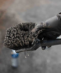 Close-up of ProGrip Wheel Face Brush With Ergonomic Rubberized Handle showing flagged tip bristles in use