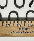 Four Pack Heavy Duty Nine Gauge Recliner Seat Springs Measuring Nineteen Point Five Inches Long With Bent Ends displayed alongside a ruler.