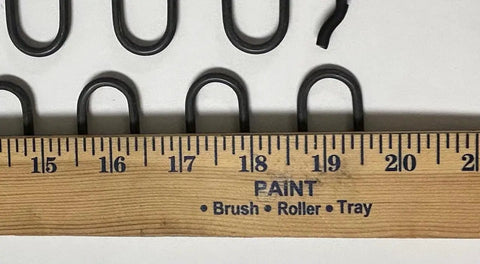 Four Pack Heavy Duty Nine Gauge Recliner Seat Springs Measuring Nineteen Point Five Inches Long With Bent Ends displayed alongside a ruler.