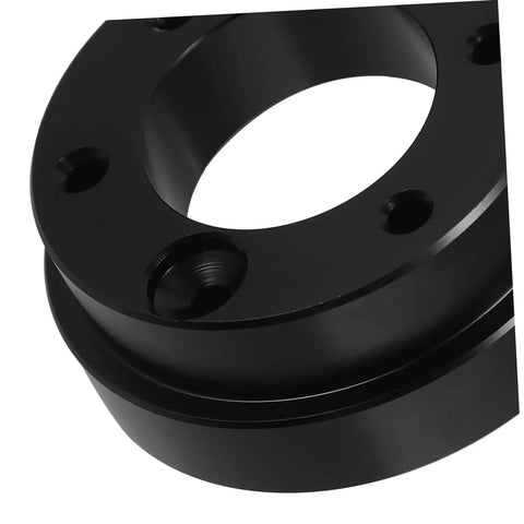 Close-up of Sturdy Racing Wheel Adapter For Cars with heavy duty metal build, showing black finish and mounting holes.