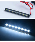LED light bar for RC crawlers, showing exposed wiring, designed for 1/24 scale models like Hella Sick Metal Roof Rack And Luggage Carrier Fits 1 24 Scale RC Crawlers Compatible With Axial Scx24 Gladiator Off Road Truck Upgrade Gear And Spare Parts.