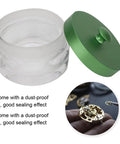 Watch Movement Oil Washing Jar For Repair Pros, glass container with green lid, durable build for watchmakers and hobbyists.