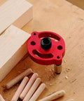 Red Self Centering Doweling Jig And Drill Guide For Precise 3 To 10 Mm Holes Portable Handheld Woodworking Locator on wood surface