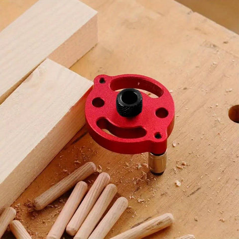 Red Self Centering Doweling Jig And Drill Guide For Precise 3 To 10 Mm Holes Portable Handheld Woodworking Locator on wood surface