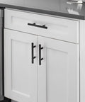Matte Black Cabinet Handles 5 Inch Overall Length With 3 Inch Hole Centers 76 Mm Cabinet Pulls Stainless Steel Drawer Knobs installed on white kitchen cabinets