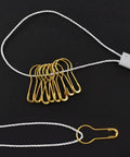 Top Shelf Hang Tag Fasteners With White Nylon String Ties And Gold Metal Security Safety Pins Bulk Kit for apparel display.