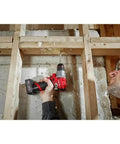 Person using Hassle Free Brushless Cordless Hammer Drill Driver Featuring A Rugged All Metal Chuck And Streamlined Compact Housing delivering torque to drill into wood.
