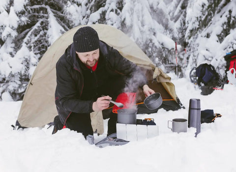 Camper using Tall 32.3 Inch By 9.5 Inch Aluminum Stove Windscreen With 10 Removable Plates Windproof Shield For Gas Backpack Stoves