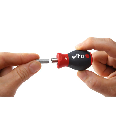 Hand holding Stubby Magnetic One Quarter Inch Bit Holder 57mm Stainless Steel With Strong Magnet And Soft Finish Grip