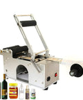 Heavy Duty Semi Auto Round Bottle Labeler For 15 To 120 Mm Containers Runs Like Clockwork At Forty Labels Per Minute with jars.