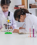 Children in lab coats with Water Electrolysis Lab Kit For Oxygen Production, Educational Apparatus in classroom setting