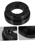 Close-up of Racing Car Steering Wheel Height Adapter Plate Kit showing black metal construction and mounting holes.