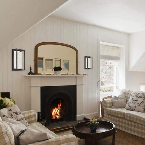 Industrial Style Wall Sconces Set Of Two With Oil Rubbed Bronze Finish And Linen Fabric Lampshades beside fireplace in living room