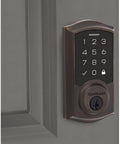 Keyless Entry SmartCode Touchpad Electronic Deadbolt With SmartKey, Satin Nickel Finish on a gray exterior door.