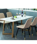 Set Of Two Heavy Duty Steel Table Legs For Kitchen Dining Tables And Craft Benches With Adjustable Leveling Feet Built Like A Tank To Carry Serious Weight In Matte Black Or Brass Shades under a marble table with beige chairs.