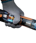 Doggone Tough 3/8 Inch Cordless Electric Ratchet Wrench Kit with 12V motor visible in a gloved hand for quick shop tasks.