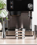 Premium Retractable Espresso WDT Tool All Stainless Steel Coffee Distribution Needle with a sleek design on a countertop.