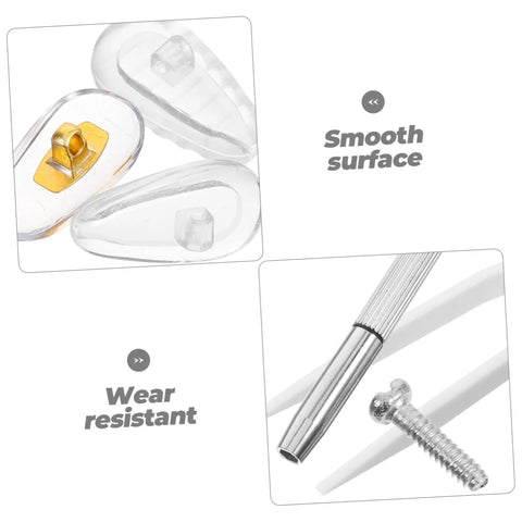 Close-up of eyeglass screws, screwdriver, and nose pads from the Eyeglass Repair Kit With Nose Pads, Screws, Screwdriver, Cleaning Cloth