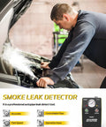 Solary car smoke leak detector for EVAP vacuum leaks, 12V tester with gauge, mechanic under hood.