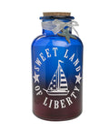 Sweet Land Of Liberty Sailboat Ombré Cork Jar Decor with red and blue ombre and sailboat design for tables