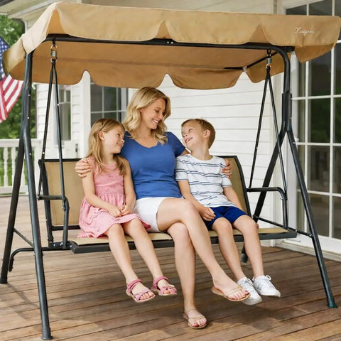 Family enjoying Three Person Outdoor Porch Swing With Canopy Shade, Breathable Textilene Seat And Armrests on a patio.