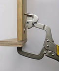 13 Inch Right Angle Corner Clamp With Dual Pins For Thin And Thick Wood holding wooden boards in place, side view.