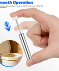 Hand holding Soft Close Trash Can Dampers Pack Of 6 Replacement Hydraulic Dampers, showing smooth operation for quiet lid closure.