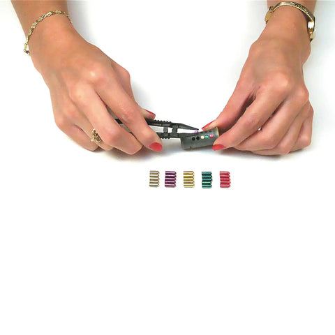 Hands using tools from Rekey All Your Locks To One Key With This Easy Pre Cut Key Kit For Schlage Type C 5 Pin Locks