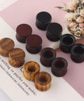 Wood Ear Tunnels Set Of 12 Pairs Dope 00 Gauge 10mm Wooden Gauges Natural Black Brown Vintage Flesh Plugs Piercing Stretcher Earrings 11 To 12mm High Comfort Fit Organic Finish shown on decorative paper