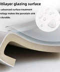 Cross-section of multilayer glazing surface on compact white porcelain undermount bathroom sink for small bathrooms and RVs.