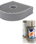 Make Your Daily Grind Smoother With This Essential Coffee Cup Riser in gray, elevating a colorful mug under a dispenser spout.