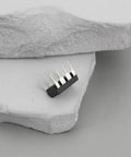 Close-up of ICL7660S CMOS voltage converter IC PDIP8, ideal for low voltage DIY projects, showing pins and compact design
