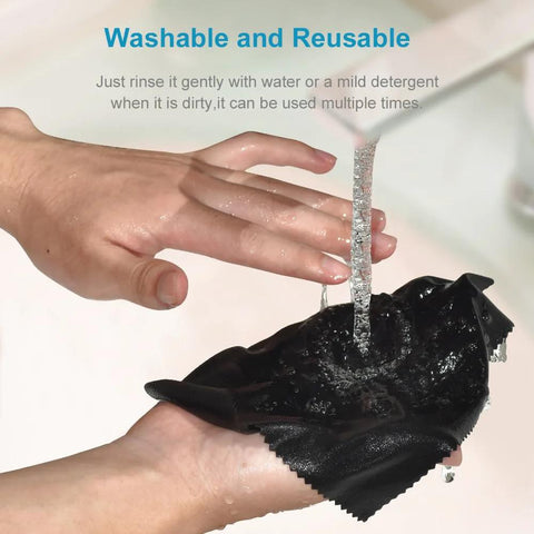 Black microfiber cleaning cloth being wrung under running water for glasses and screens.
