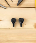 100 Pack Black Carbon Steel Thumb Screws For PC Cases With Anti Loosening Design Tool Free Side Panel Locking Fasteners close-up on black screws.