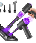 Person using 3 In 1 Mini Computer Vacuum Cleaner With 14500 Pa Suction, 110000 RPM Air Duster And Blower on keyboard