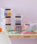 Heavy Duty Clear Plastic Storage Bins With Lids 6 Pack 4 Quart Polypropylene for organizing craft supplies and yarn.
