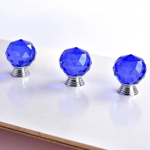 Twelve Pack Of 30mm Round Blue Crystal Glass Cabinet Knobs With Sleek Chrome Hardware Screws Included For Kitchen Cupboard And Dresser No Sweat Install Smooth Moving Home Decor. Three 30mm round blue crystal knobs with chrome bases arranged on a surface.