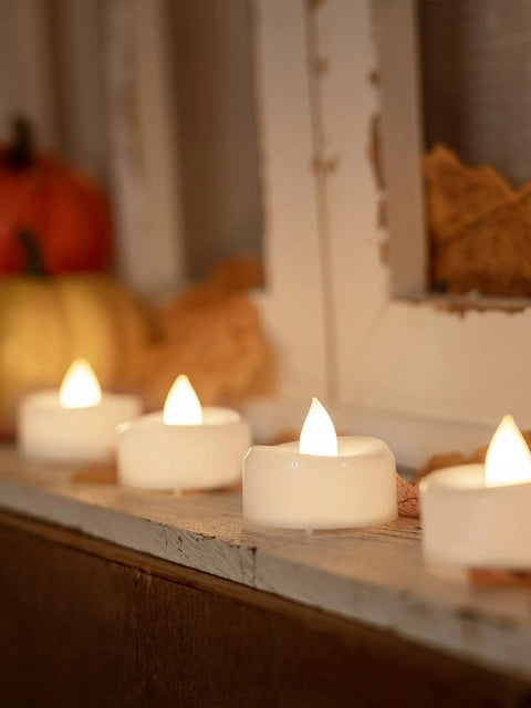 Bulk 100 LED Tea Lights Battery Operated Flameless Tealights With Realistic Flicker For Weddings Parties And Holiday Decor And Romantic Vibes 1.5 Inch Diameter 1.25 Inch Height Long Lasting Up To 200 Hours