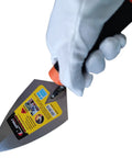 Gloved hand holding a 6-inch carbon steel pointing trowel, part of the 2-Piece Pointing And Gauging Trowel Set for masonry.