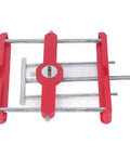 Dead On Mortise Tenon Jig Woodworking Doweling Kit Self Centering Loose Tenon System with Punch Locator top view, red and silver components.