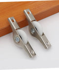 Smooth Gliding Sliding Door Rollers 4 Pack Heavy Duty Barn Door Wheels showing metal casters with white wheels for cabinets.