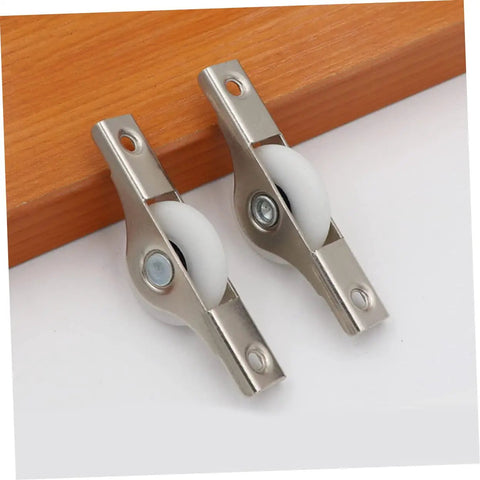 Smooth Gliding Sliding Door Rollers 4 Pack Heavy Duty Barn Door Wheels showing metal casters with white wheels for cabinets.