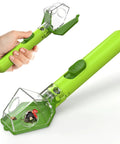 Bug Hunter Kit With 6X Magnifier Glass For Indoor Outdoor STEM Exploration Kids Friendly Bug Catcher Tool With One Hand Thumb Slide Easy Operation Ideal Gift For Boys Girls And Adults Green shown in hand.