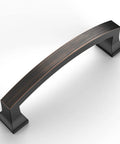 Oil Rubbed Bronze Cabinet Pulls, 4 Inch Center-To-Center, showing top view of modern curved handle with fine detailing.
