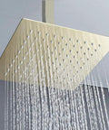 Brushed Gold Wall Mounted Shower System With Large Rainfall Head, close-up of water flow from rainfall fixture.