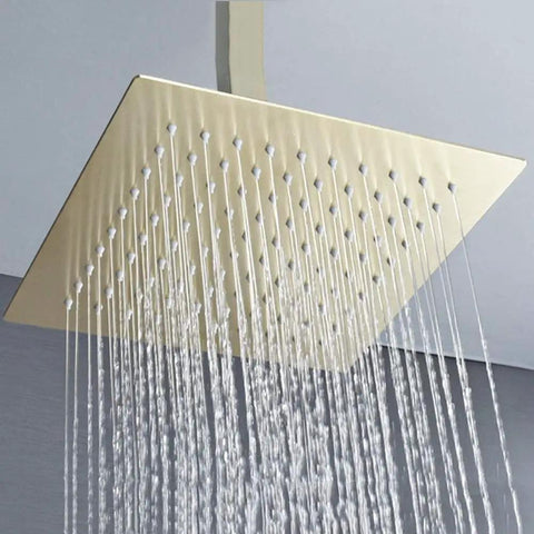 Brushed Gold Wall Mounted Shower System With Large Rainfall Head, close-up of water flow from rainfall fixture.