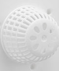 Close-up of Jauarta Plastic Bathtub Drain Stopper, Effective Hair Trap, white durable plastic with a grid design.