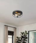 12 Inch 2 Light Farmhouse Flush Mount Ceiling Light With Seeded Glass Shade In Sand Black Finish in a modern living space.