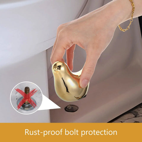 Premium Quality Pretty Sweet Ceramic Toilet Bolt Caps With Top Notch Gold Bird Trim Easy Swap Screw Covers For Modern Bathroom Decor And Straight Forward Setup, shown being installed.