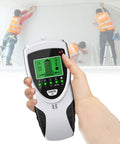 No Sweat Stud Finder And Wall Scanner With Hd Lcd Display in hand, detecting studs while workers mount drywall above.